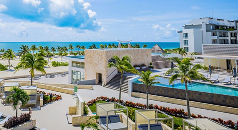 An aerial view of the main pool area of Majestic Elegance Costa Mujeres