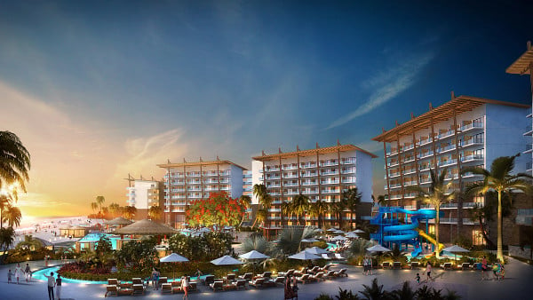 Rendering of three resort buildings during sunset