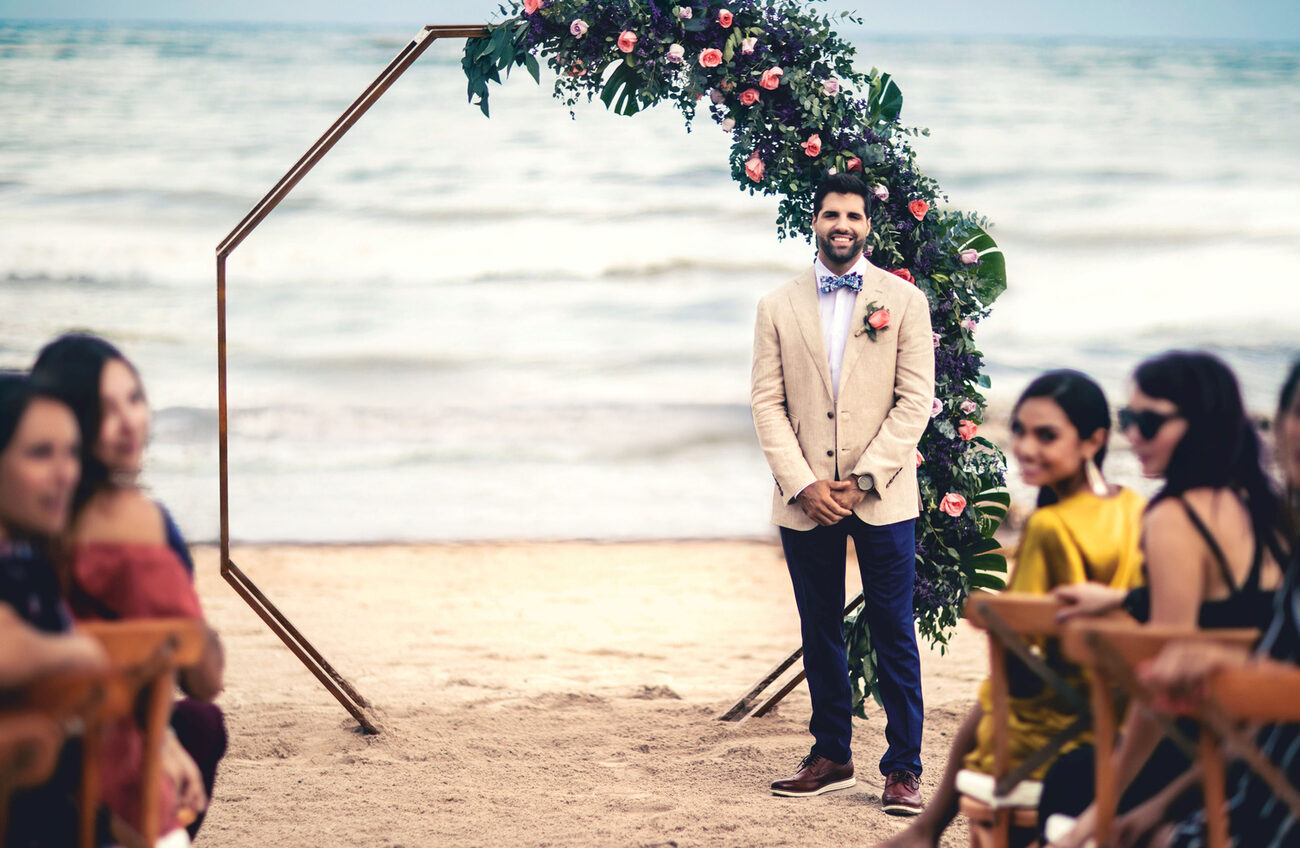 Groom at the alter of a beach wedding