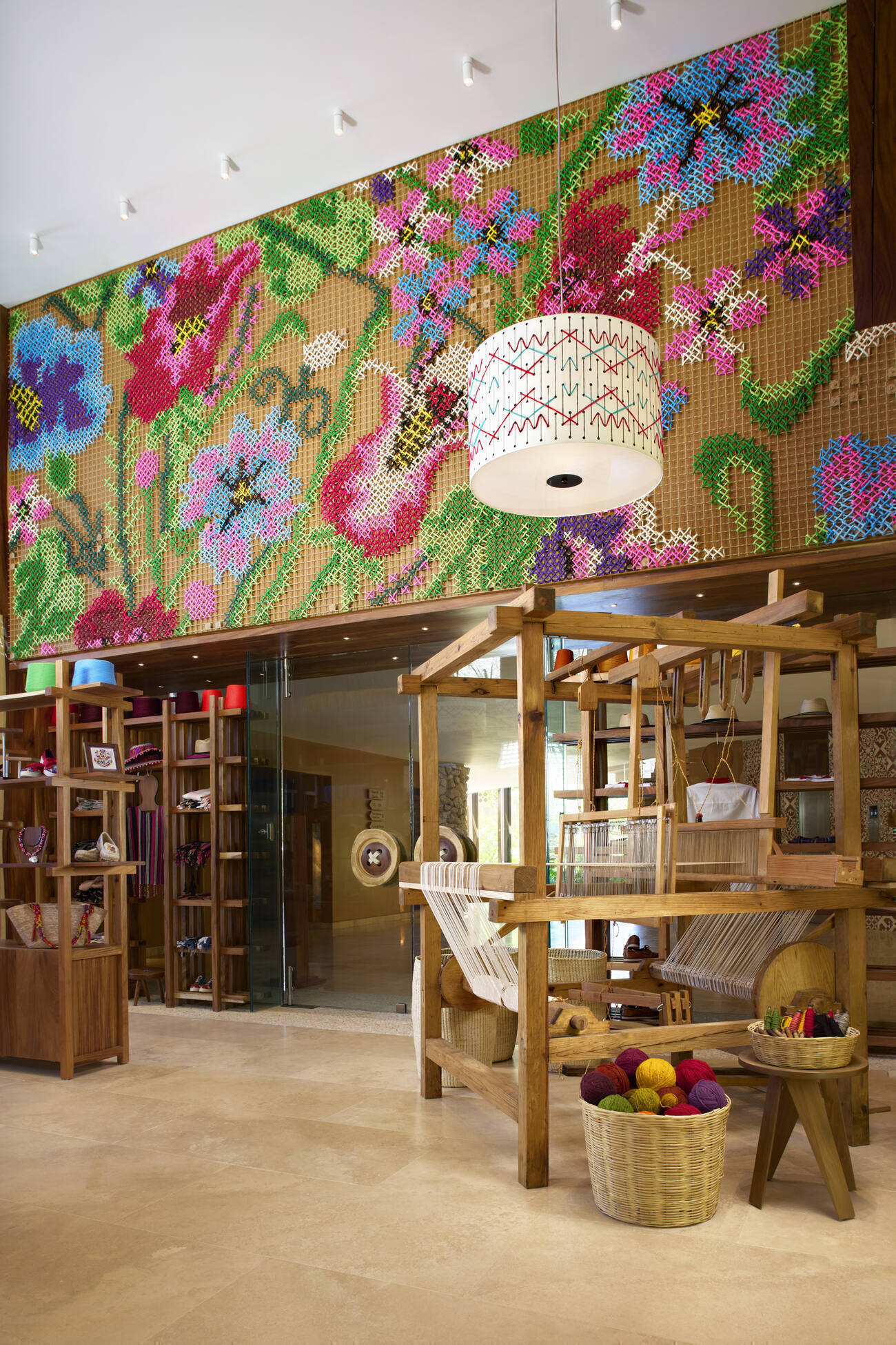 Room of yarn with yarn flower designs on the walls